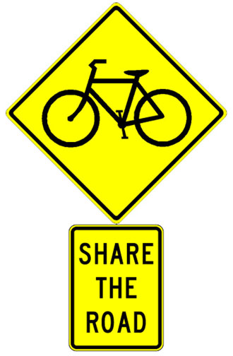 Figure 5 shows signs warning motorists of the presence of bicycles and of the need to share the road with cyclists.  
